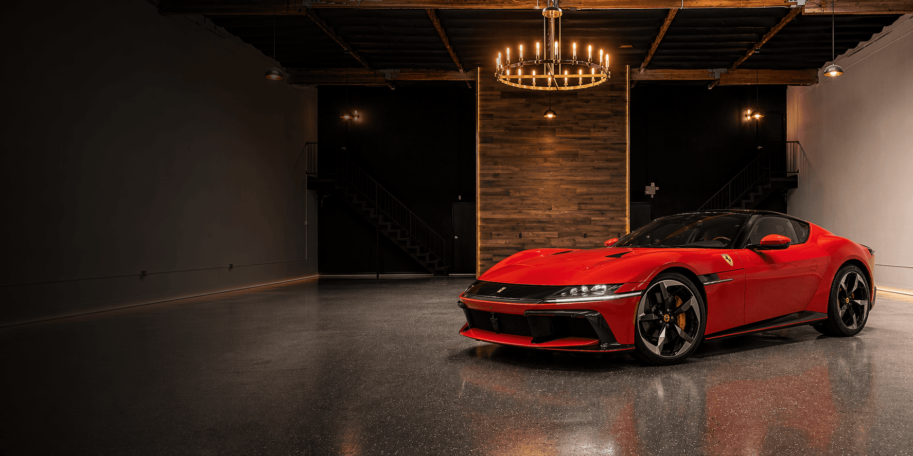 Red Ferrari staged inside Canyon Exotic Motors private storage vault